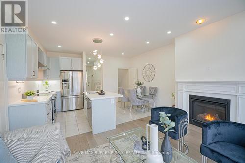 35 Hogan Manor Drive, Brampton, ON - Indoor With Fireplace