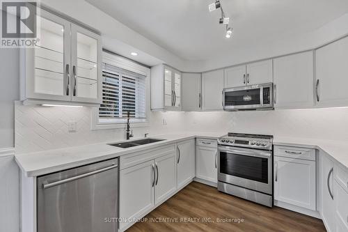 21 Leslie Avenue, Barrie, ON - Indoor Photo Showing Kitchen With Double Sink