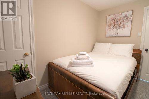 #B - 910 Concession Rd 17 W, Tiny, ON - Indoor Photo Showing Bedroom