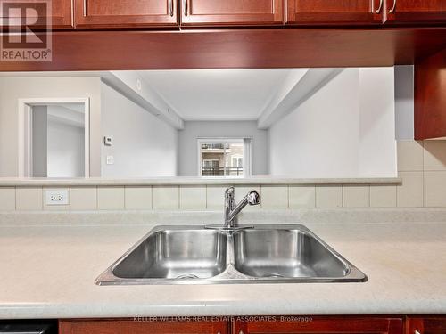 304 - 3075 Thomas Street, Mississauga, ON - Indoor Photo Showing Kitchen With Double Sink