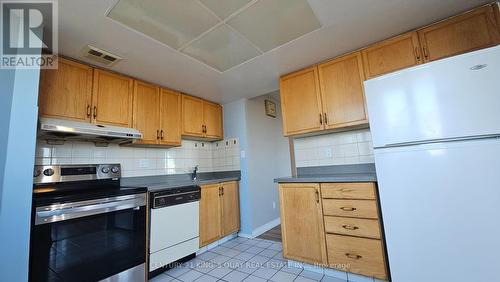 608 - 30 Thunder Grove, Toronto, ON - Indoor Photo Showing Kitchen