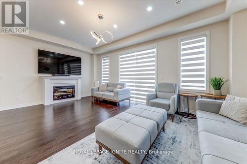 20 Icemaker Way, Whitby, ON - Indoor Photo Showing Living Room With Fireplace