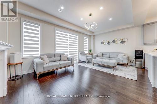 20 Icemaker Way, Whitby, ON - Indoor Photo Showing Living Room With Fireplace