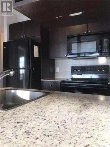 1717 - 181 Village Green Square, Toronto, ON - Indoor Photo Showing Kitchen With Double Sink