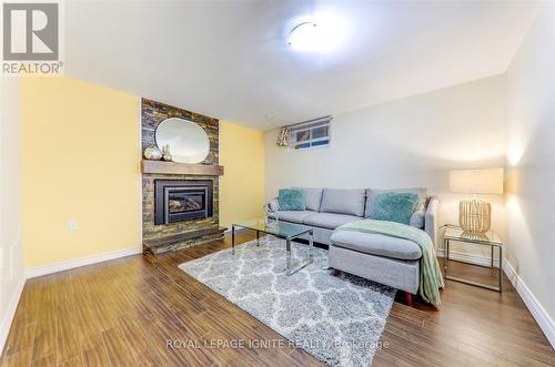 4010 Ellesmere Road, Toronto, ON - Indoor Photo Showing Living Room With Fireplace