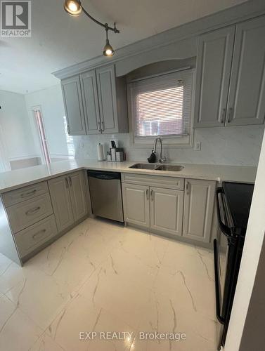 16 Old Colony Drive, Whitby, ON - Indoor Photo Showing Kitchen With Double Sink