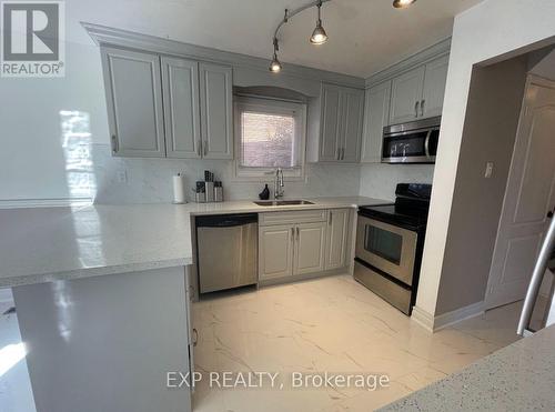 16 Old Colony Drive, Whitby, ON - Indoor Photo Showing Kitchen With Double Sink