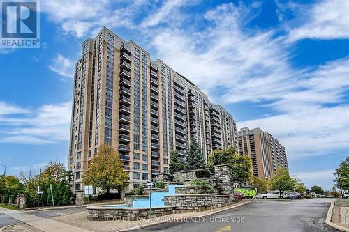 726 - 18 Mondeo Drive, Toronto, ON - Outdoor With Balcony With Facade