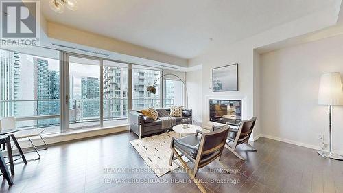 2803 - 180 University Avenue, Toronto, ON - Indoor Photo Showing Living Room With Fireplace