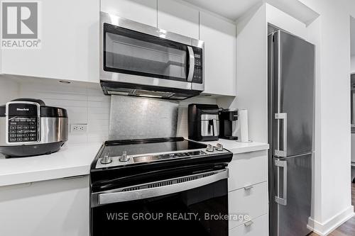 825 - 30 Tretti Way, Toronto, ON - Indoor Photo Showing Kitchen