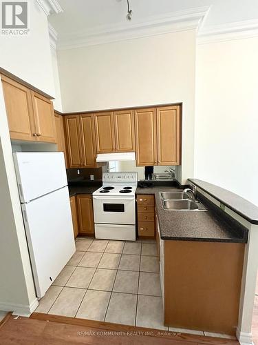 107 - 7 Lorraine Drive, Toronto, ON - Indoor Photo Showing Kitchen With Double Sink