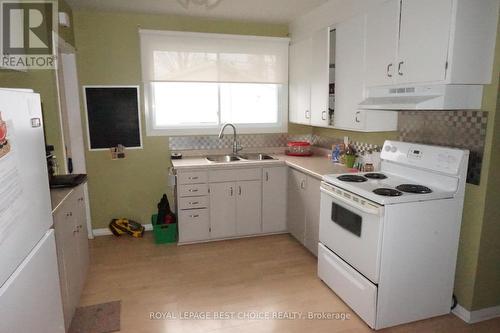 105 May Street, Temiskaming Shores (New Liskeard), ON - Indoor Photo Showing Kitchen With Double Sink