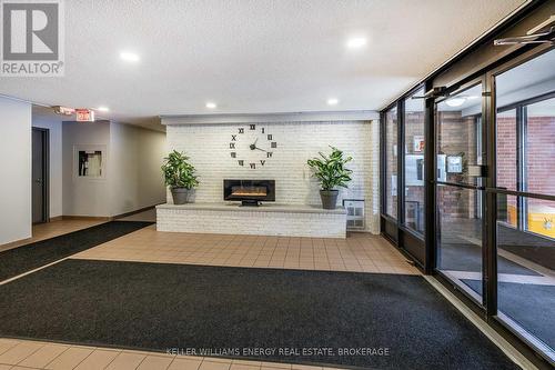 207 - 131 Taunton Road E, Oshawa (Centennial), ON - Indoor Photo Showing Other Room With Fireplace