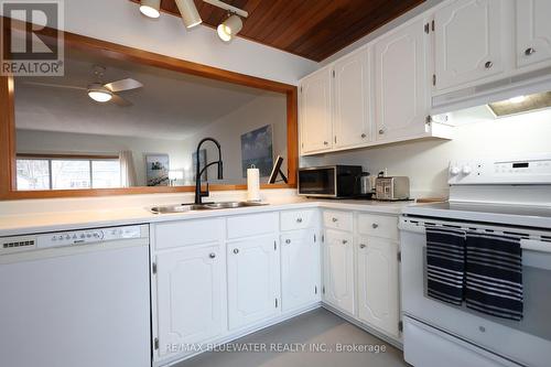 12 Park Avenue, Lambton Shores (Grand Bend), ON - Indoor Photo Showing Kitchen With Double Sink