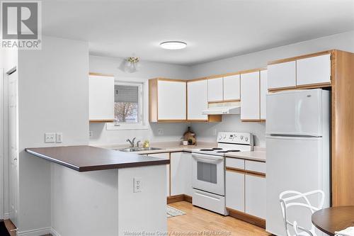 52 Cherry, Mcgregor, ON - Indoor Photo Showing Kitchen With Double Sink