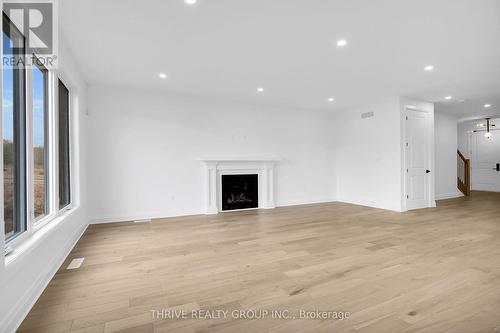 3958 Campbell Street N, London, ON - Indoor Photo Showing Living Room With Fireplace