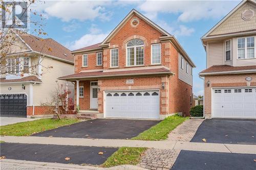 View of property with a garage - 584 Winterburg Walk, Waterloo, ON - Outdoor With Facade