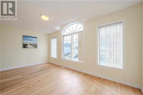 Empty room featuring light wood-type flooring - 584 Winterburg Walk, Waterloo, ON - Indoor Photo Showing Other Room