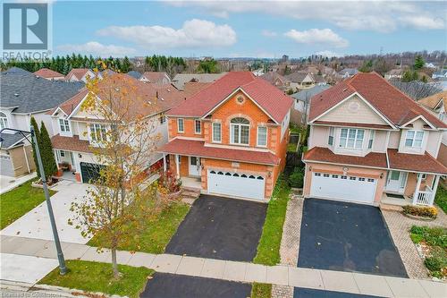 View of front of home with a garage - 584 Winterburg Walk, Waterloo, ON - Outdoor With Facade