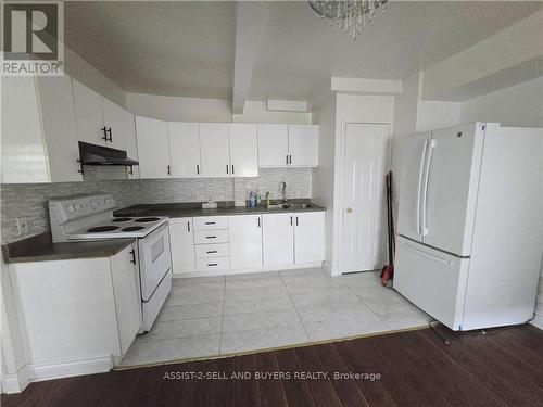 307-309 Prince Arthur Street, Cornwall, ON - Indoor Photo Showing Kitchen With Double Sink