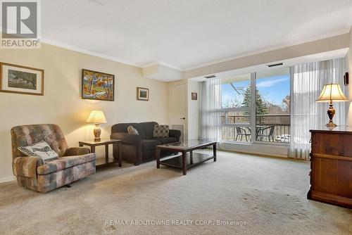 202 - 1389 White Oaks Boulevard, Oakville, ON - Indoor Photo Showing Living Room