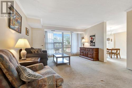 202 - 1389 White Oaks Boulevard, Oakville, ON - Indoor Photo Showing Living Room