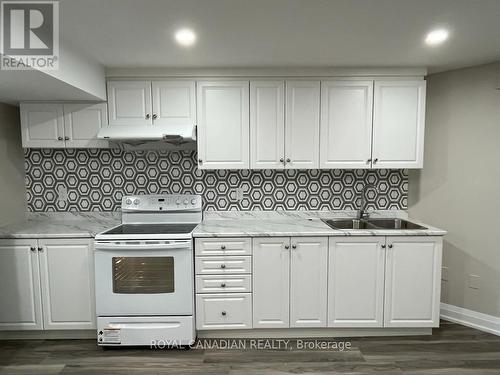 Bsmt - 24 Tregate Crescent, Brampton, ON - Indoor Photo Showing Kitchen With Double Sink