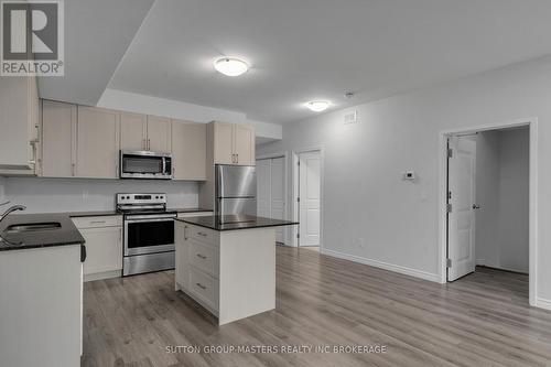 204 - 1015 Terra Verde Way, Kingston (City Northwest), ON - Indoor Photo Showing Kitchen With Double Sink