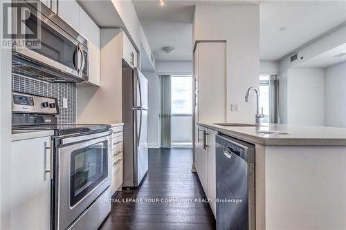 1409 - 65 Speers Road, Oakville, ON - Indoor Photo Showing Kitchen With Upgraded Kitchen