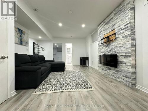 Bsmt - 1022 Colonial Street, Pickering, ON - Indoor Photo Showing Living Room With Fireplace