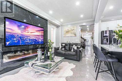 1451 Bews Landing, Milton, ON - Indoor Photo Showing Living Room With Fireplace