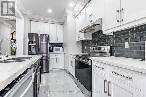 1451 Bews Landing, Milton, ON - Indoor Photo Showing Kitchen With Stainless Steel Kitchen With Double Sink With Upgraded Kitchen