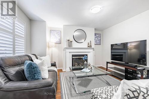 676 Speyer Circle, Milton, ON - Indoor Photo Showing Living Room With Fireplace