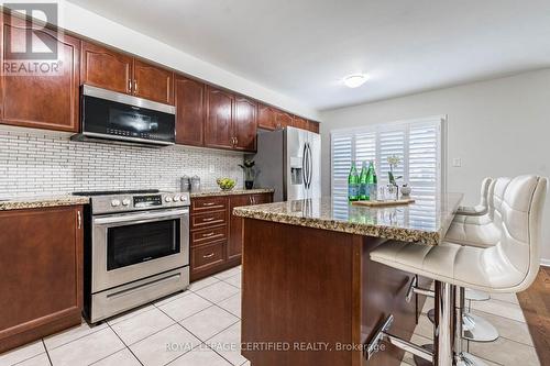 676 Speyer Circle, Milton, ON - Indoor Photo Showing Kitchen With Upgraded Kitchen