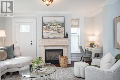 enjoy a cozy fire - 49 James Street, Milton, ON - Indoor Photo Showing Living Room With Fireplace