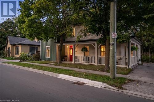 enjoy your evenings on the wrap around porch - 49 James Street, Milton, ON - Outdoor With Deck Patio Veranda