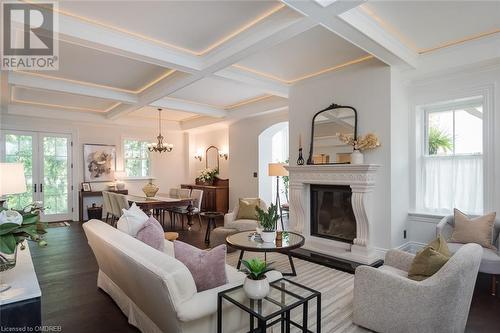 coffered ceilings and inset lighting - 49 James Street, Milton, ON - Indoor Photo Showing Living Room With Fireplace