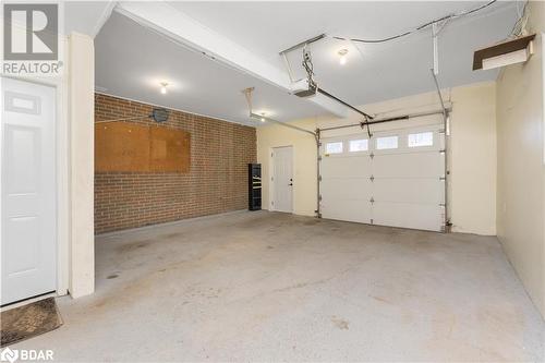 67 Eleanor Crescent, Georgetown, ON - Indoor Photo Showing Garage