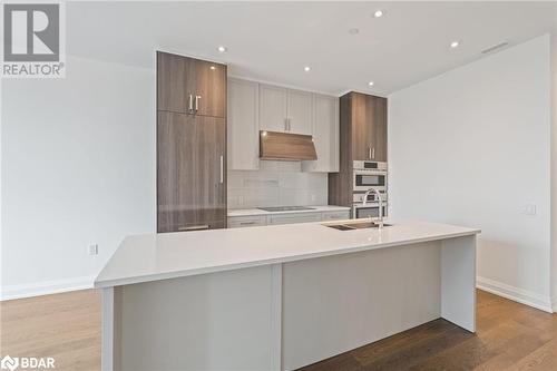 42 Mill Street Unit# 403, Georgetown, ON - Indoor Photo Showing Kitchen With Double Sink