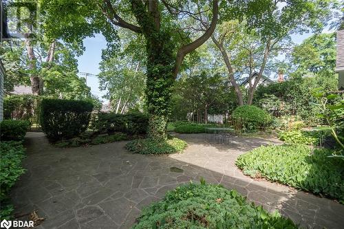 Flagstone landscaping on the oversized double lot - 397 Trafalgar Road, Oakville, ON - Outdoor