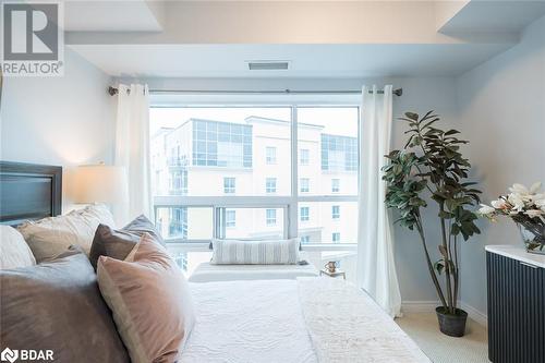 Floor to Ceiling Windows - 1421 Costigan Road Unit# 501, Milton, ON - Indoor Photo Showing Bedroom