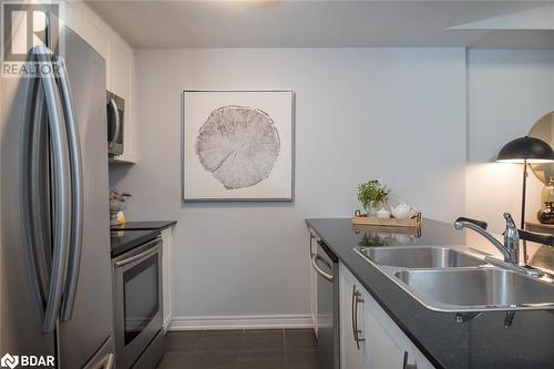 1421 Costigan Road Unit# 501, Milton, ON - Indoor Photo Showing Kitchen With Double Sink