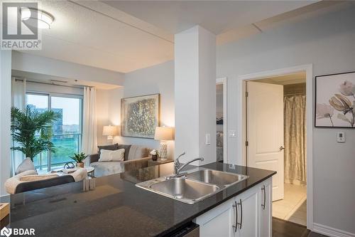 1421 Costigan Road Unit# 501, Milton, ON - Indoor Photo Showing Kitchen With Double Sink