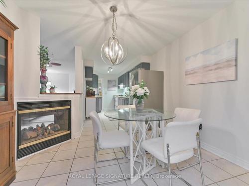 47 Manorwood Crt, Caledon, ON - Indoor Photo Showing Dining Room With Fireplace