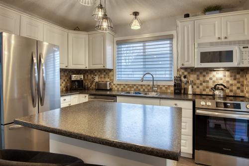 511 Duncan Avenue, Penticton, BC - Indoor Photo Showing Kitchen With Double Sink