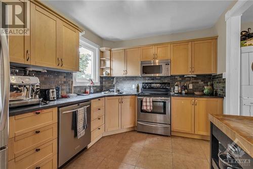 9 Melrose Avenue, West Centre Town (4203 - Hintonburg), ON - Indoor Photo Showing Kitchen With Double Sink