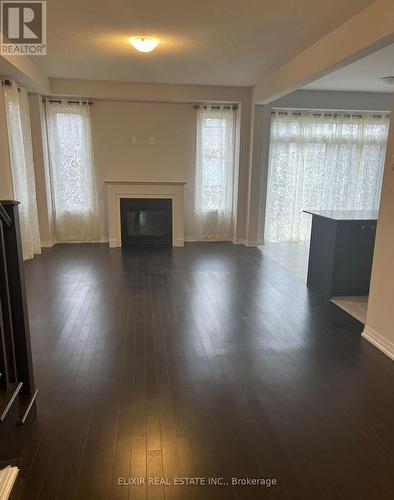 195 Spitfire Drive, Hamilton, ON - Indoor Photo Showing Living Room With Fireplace