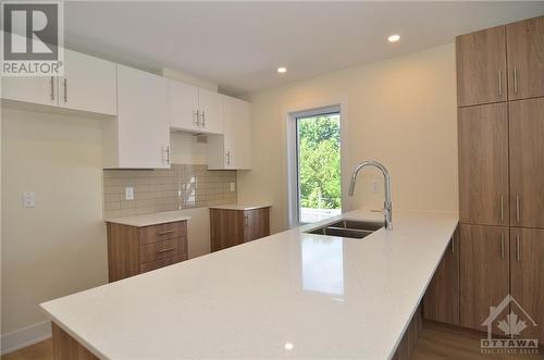 183 Columbus Avenue, Overbook - Castleheights And Area (3502 - Overbrook/Castle Heights), ON - Indoor Photo Showing Kitchen With Double Sink