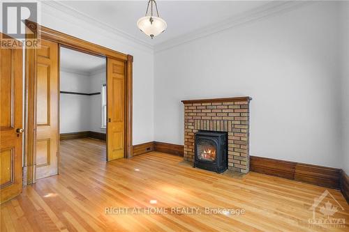 27 & 29 Third Avenue, Ottawa, ON - Indoor With Fireplace