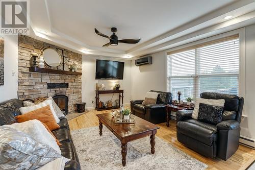 47 Western Island Pond Drive, Torbay, NL - Indoor Photo Showing Living Room With Fireplace